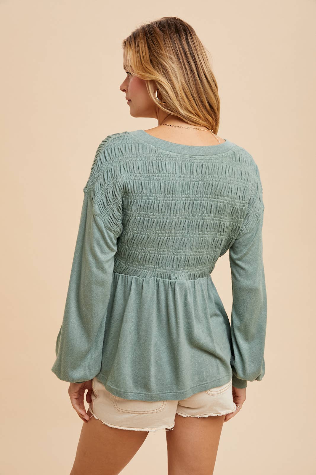 LONG SLEEVE V NECK BABYDOLL SWEATER